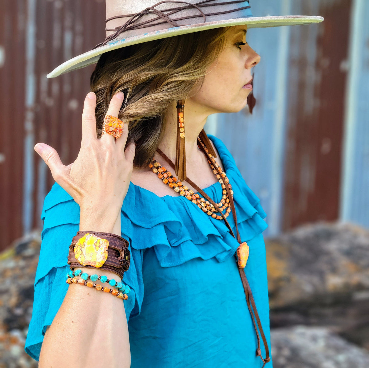 Leather Fringe Earrings with Orange Regalite