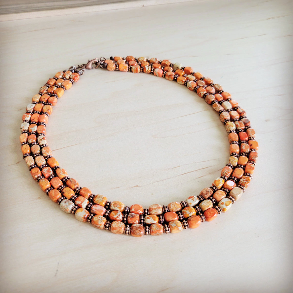 Triple Strand Orange Regalite Layered Necklace