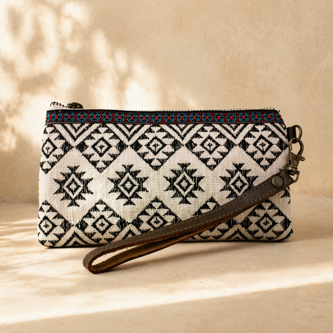 Geometric Embroidered Wristlet with Leather Strap